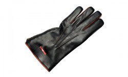 Special glove after amputation of the thumb. The heating band was placed directly into each fingertip and protects the sensitive amputation areas of the thumb.